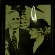 Cover image of [Georgina Luxton and unidentified man in front of unidentified stone building]